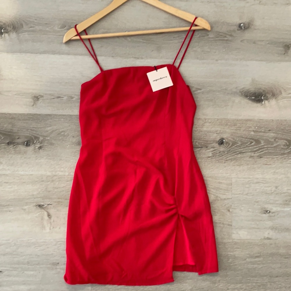 Never been worn Superdown red mini dress with spaghetti straps and thigh slit
